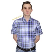 Джинсовая рубашка в среднего размера фиолетово-голубого цвета клетку. Модель свободного кроя с двумя большими карманами. Толщина материи 32.